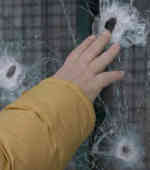 Bulletholes glass